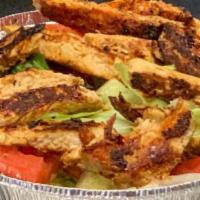 Grilled Marinated Chicken Breast  · With lettuce, tomato & cucumber.