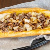 Philly Cheesesteak · Ribeye steak, grilled onion and swiss cheese.