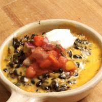 Black Beans & Rice · Vegetarian. Our Black bean blend, Cheddar, a side of Our famous salsa, and your choice of sa...