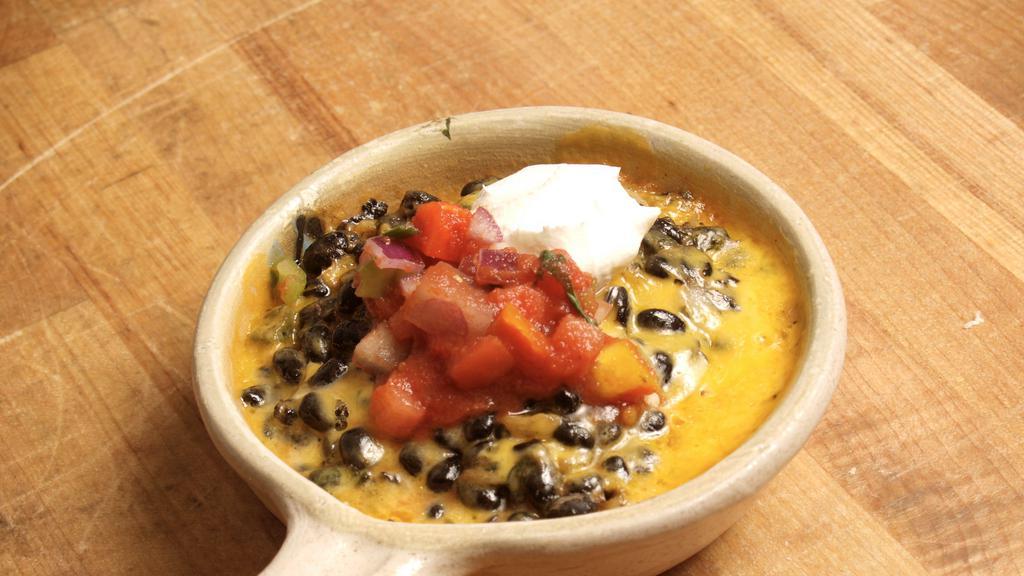 Black Beans & Rice · Vegetarian. Our Black bean blend, Cheddar, a side of Our famous salsa, and your choice of sauce.