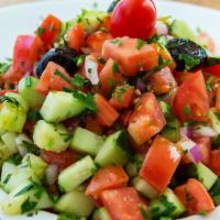 Medium Shepherd Salad · Freshly chopped tomatoes, onions, and cucumbers served with olive oil and vinegar dressing.
