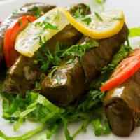 Stuffed Grape Leaves (Yaprak Sarma) · Grape leaves stuffed with rice and vegetables prepared with olive oil.