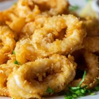Fried Calamari (Kalamar) · Crispy fried calamari served with marinara sauce. Contains gluten and dairy.