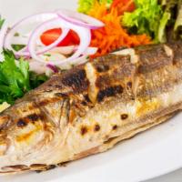Bronzini · Grilled Mediterranean sea bass served with fresh house salad.