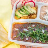 Vegan Birria Plate · Vegan. A stew with jackfruit birria, rice and beans, onions, cilantro, lime and tortillas on...