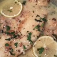 Chicken Francaise · Chicken breast fried in a light batter, topped with a creamy lemon sauce.