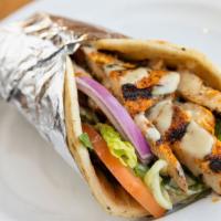 Chicken Gyros · Grilled marinated chicken, Romaine, tomato, cucumber, red onion, and tahini. Served with Art...