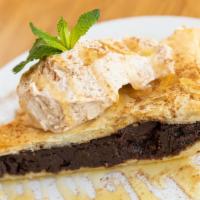 Chocolate Galaktoboureko · Layers of phyllo filled with rich chocolate semolina custard and topped with house-made cinn...