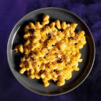 Mac & Yellow · Our signature creamy, cheesy, oozy mac and cheese topped with shredded cheese