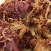 House Made Corned Beef  · Gluten free. With a cabbage wedge, roasted potatoes, onion and bacon.