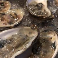 Oysters · Bed of 6 or 12.