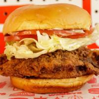 Cap Hill Fried Chicken Sandwich · Buttermilk fried natural chicken breast, tomato slices, lettuce, mayo.