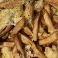 Deluxe Fries Special · French fries with fried green peppers, fried onions, gravy and three blended cheese served o...