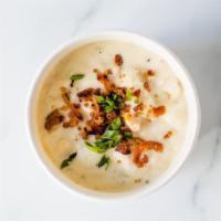 New England Clam Chowder · New England clam chowder, bacon, chives served with house chips.