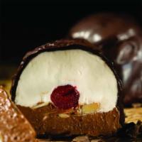 Gelato Bomba Chocolate/Vanilla · Classic vanilla and chocolate gelato separated by a cherry and sliced almonds covered in cin...
