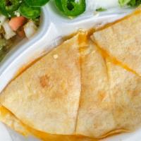 Quesadilla · Served with two freshly made flour tortillas filled with melted Monterrey Jack & Cheddar Che...