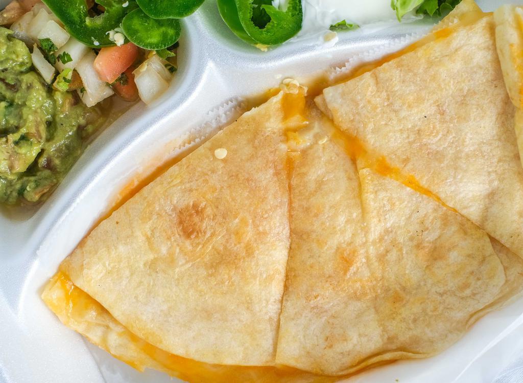 Quesadilla · Served with two freshly made flour tortillas filled with melted Monterrey Jack & Cheddar Cheese, with lettuce, Pico de Gallo, guacamole, and sour cream.