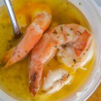 Gambas Al Ajillo · Jumbo shrimp sautéed with garlic, a mix of Spanish herbs, and white wine. Served with toaste...