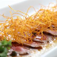 Beef Tataki · Seared beef tenderloin with crispy sweet potato.
*Consuming raw or undercooked meats, poultr...