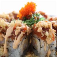 Kazan Roll · shrimp tempura, imitation crab meat, spicy tuna, seaweed salad and crunch on top, tobiko