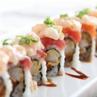 Scallop Lover Roll · spicy tuna and shrimp tempura inside, salmon, tuna and spicy scallop on top, tobiko, green o...