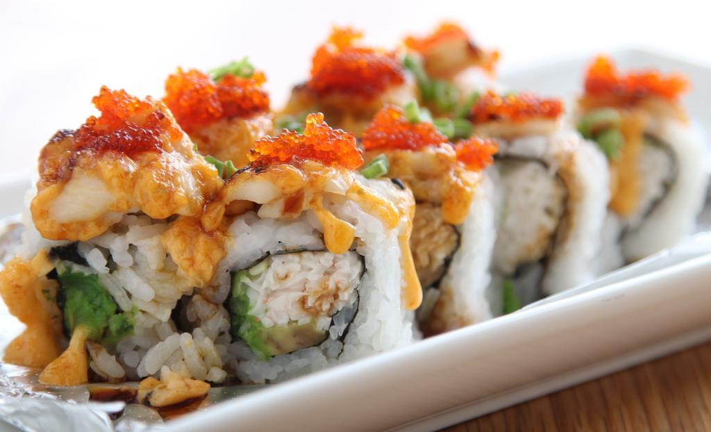 Love Roll · Baked scallop on California roll, tobiko, green onion.