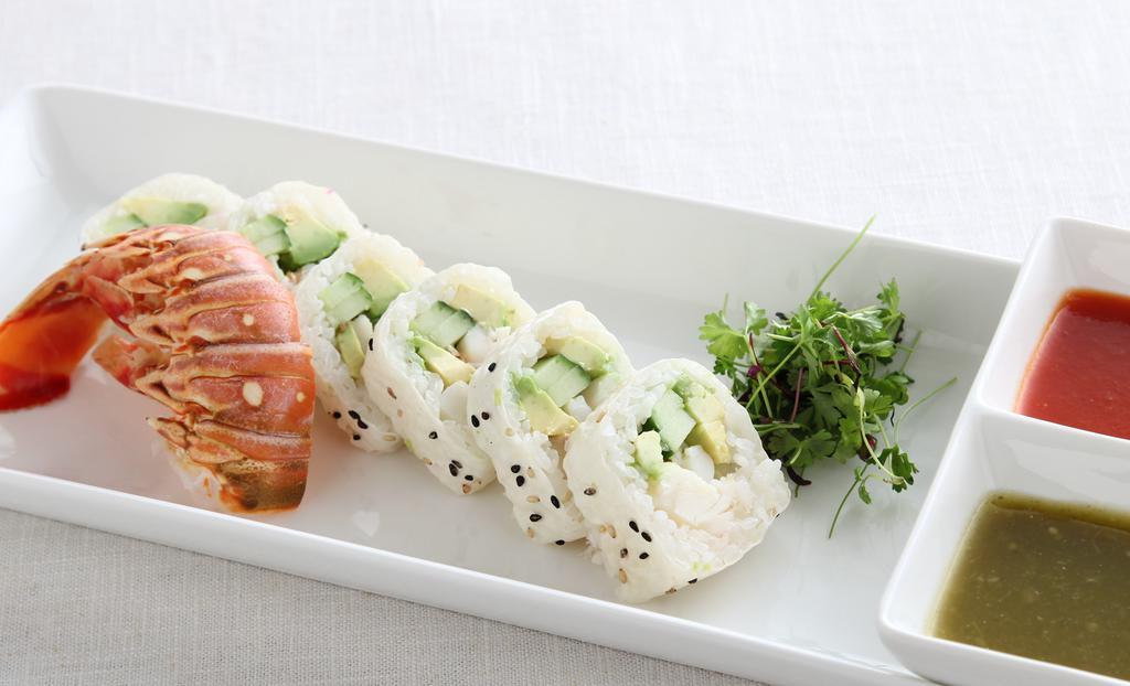 Lobster Roll · Cooked half lobster tail, avocado, cucumber, tobiko, soy paper.
