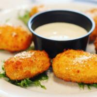 Jalapeno Poppers · Breaded jalapeño peppers stuffed with cheddar cheese flash fried and served with ranch.