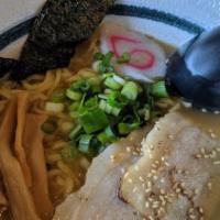 Shoyu Ramen · Tonkotsu (Pork) Broth with Soy Sauce Based Noodle Soup Topped with 2 Pieces of Chashu (Brais...