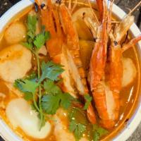 Hot And Sour Seafood Ramen · Spicy Herbal Based Broth With Kaffir Lime Leaves, Lemongrass, Galangal, Cilantro, Lime Toppe...
