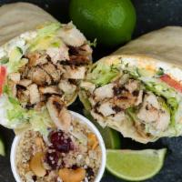 Chicken Gyro Wrap · Grilled marinated chicken, feta cheese, Greek seasoning, onions, tomatoes and cucumbers, shr...