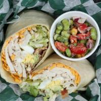 Chicken Cobb Wrap · Grilled marinated chicken, cheddar, bacon, fresh avocado, lettuce, tomato, hard boiled egg a...