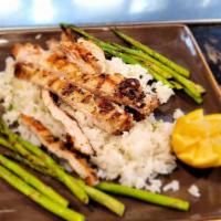 Rosemary Chicken And Grilled Asparagus · A fresh rosemary marinated grilled chicken breast served  with cilantro lime rice, grilled a...