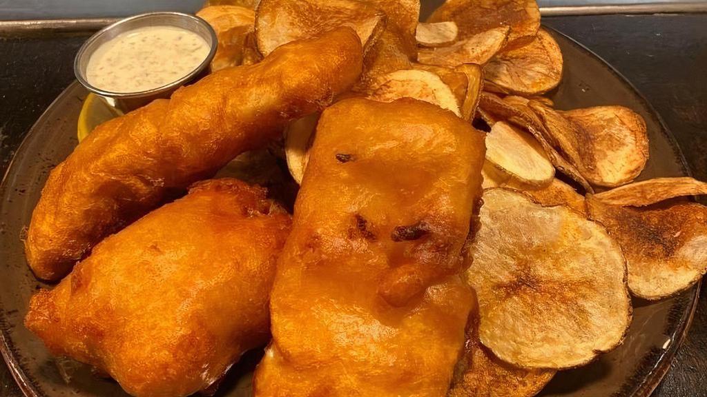 Fish (3) N Chips Fresh Atlantic Cod / Sliced Potato Chips · Crispy beer battered fresh Atlantic cod fried golden  brown and served with house made tater sauce with freshly sliced potato chips