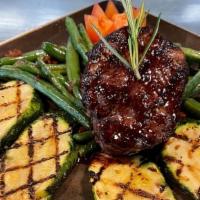 Baseball Cut Top Sirloin W/ Red Wine Reduction / Green Bean /Grilled Zucchini · 8oz Top Sirloin cut from the center, it’s lean, thick,  and flavorful. The steak is tenderiz...