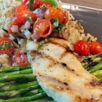 Grilled Pacific Halibut W/Bruschetta / Asparagus / Creamy Rice · Fresh catch wild Pacific Halibut grilled perfectly.  Served on a bed of kosher salt and pepp...