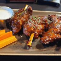 Pork Shank Wings · 4 - 4oz pork shank wings fried to crispy  perfection, tossed with a choice of buffalo sauce ...