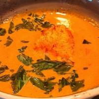 Creamy Tomato Soup · - roasted ripe tomatoes, sautéed yellow onions,  carrots, blended with cream then strained f...