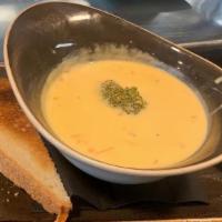 Broccoli & Cheese Soup · Fresh chopped broccoli, shredded carrots,  white onions simmered in a smooth cheese sauce. S...