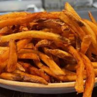 Rosemary Truffle Fries - Side · Hand-cut fries tossed in rosemary and truffle oil