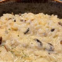 Creamy Wild Rice - Side · Seasoned long grain wild rice cooked with a heavy cream