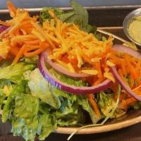 Side Salad - Lettuce/Tom/Carrot/Onion/Cheddar - Side · Mixed lettuce, fresh tomato, shaved carrots, shredded cheddar cheese, and red onion your cho...