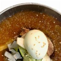 Chilled Buckwheat Noodle Soup · Boiled buckwheat noodles in cooled beef broth, veg, sliced beef, and broiled egg.