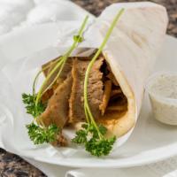 Gyro · Served with onions, tomatoes, and tzatziki sauce.