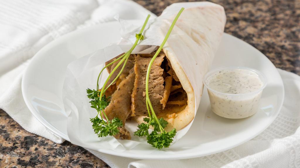 Gyro · Served with onions, tomatoes, and tzatziki sauce.