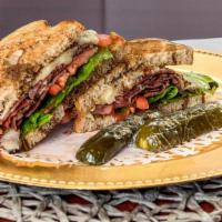 Hot Pastrami · Pastrami, swiss cheese, lettuce, tomato and spicy mustard on rye bread