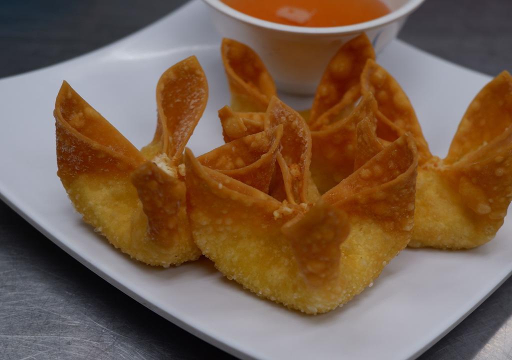 Crab Rangoons (4 Pc) · Wonton wrapper, cream cheese, celery, green onions, imitation crab; sweet and sour sauce.