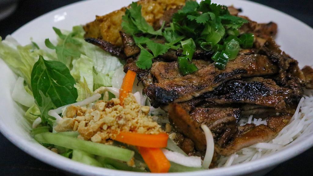 Vermicelli (Grilled Meats) · Marinated and charcoal grilled meats served with mixed greens, pickled carrots, green onions, sprouts, peanuts, and fish sauce. All on top of vermicelli noodles!
