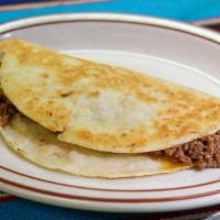 Chicken Or Beef Quezadilla · choice of beef tips, ground beef, or shredded beef  or shredded chicken