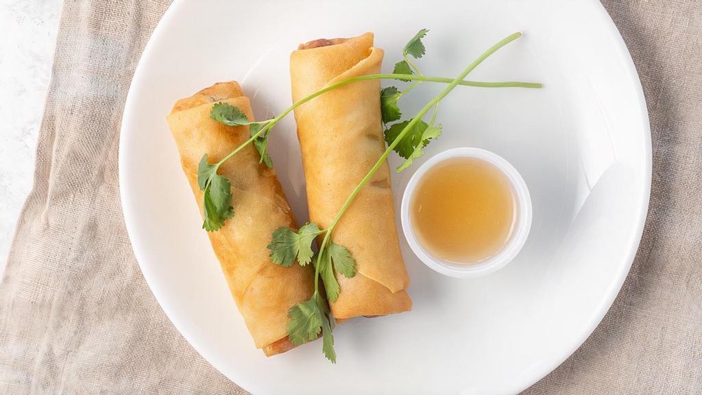 Vegetarian Spring Rolls (2) · 2 pieces. rice paper or crispy dough filled with shredded vegetables.